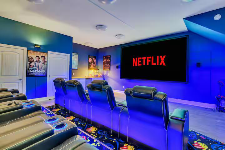 Private home theater with LED lighting and stadium seating